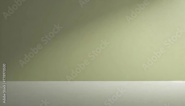 Fototapeta Close-up view of a mockup on a monochrome wall with soft shadows from leaves