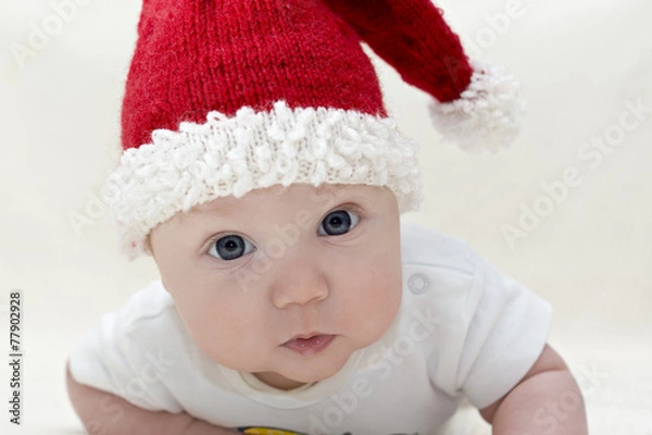 Fototapeta Small boy in knitted red hat