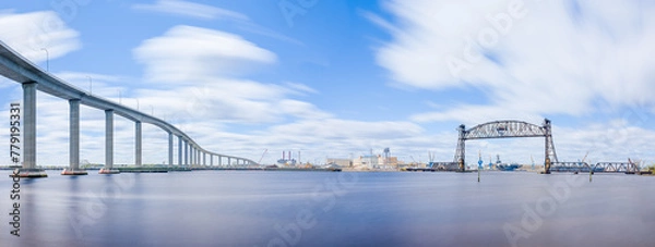 Fototapeta The Jordan Bridge over the Elizabeth River on the border of Norfolk and Chesapeake Virginia in bright midday weather