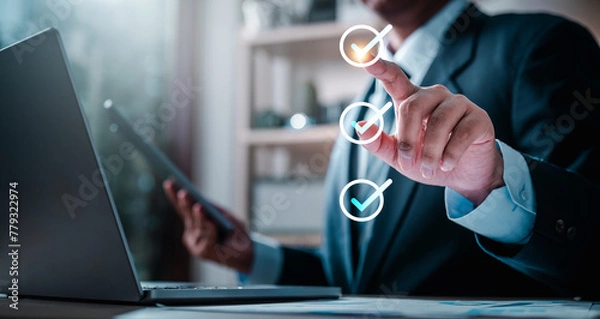 Fototapeta checklist, checkmark, chart, intelligence, management, marketing, solution, strategy, analysis, information. A man is pointing at three check marks. Concept of accomplishment or satisfaction.