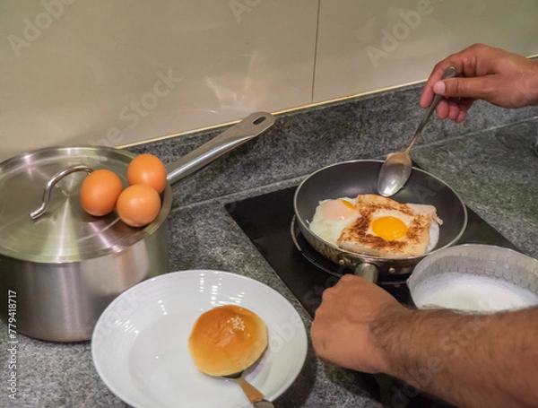 Obraz Breakfast - Fried Egg, Bread, in kitchen