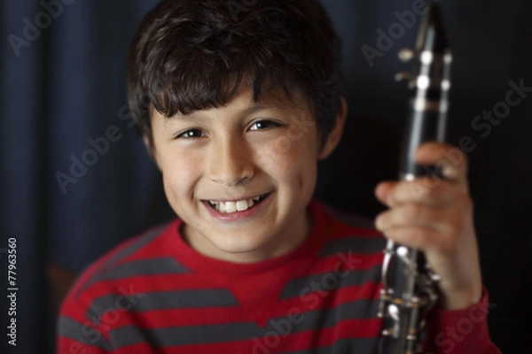 Obraz Smiling boy with clarinet