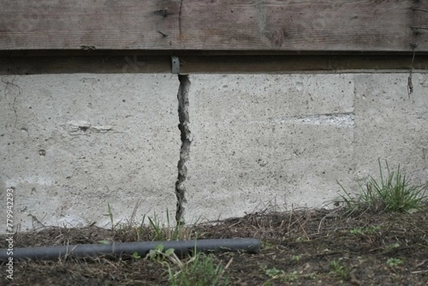 Obraz Close-up of a deep residential house foundation crack.