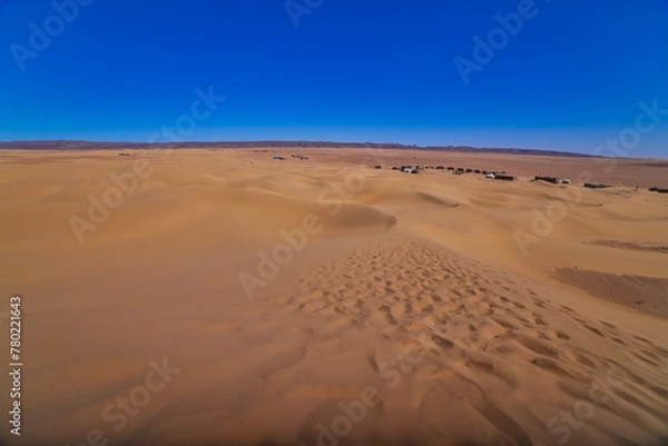 Fototapeta A panoramic sand dune near the desert camp at Mhamid el Ghizlane in Morocco