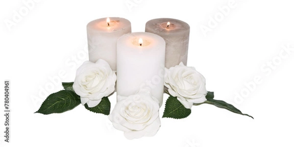 Fototapeta Three lit white candles with white roses around them