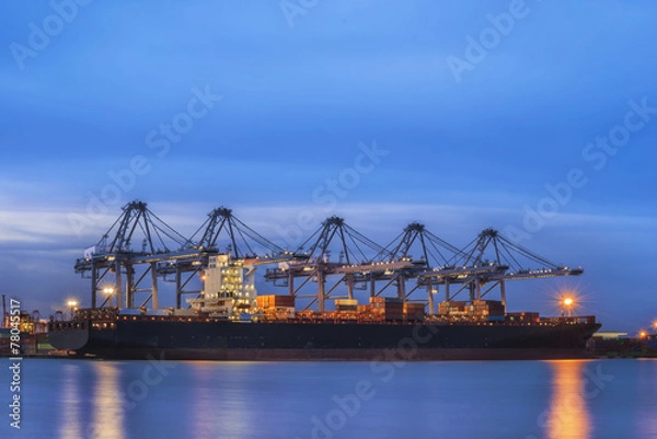 Fototapeta Container Cargo freight ship with working crane bridge