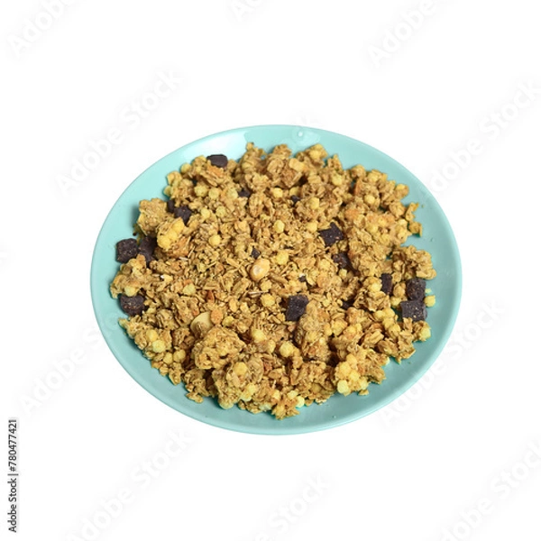 Fototapeta Blue-green plate with wheat muesli and oat flakes with chocolate on a white background