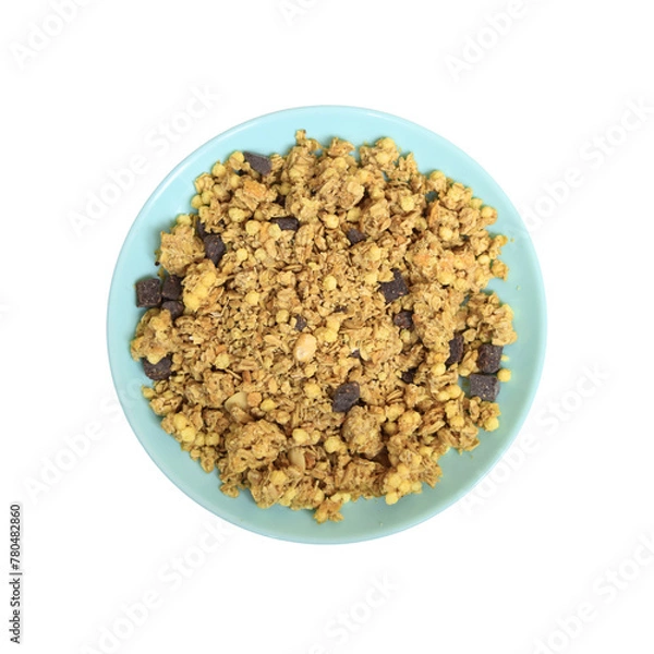 Fototapeta Blue-green plate with wheat muesli and oat flakes with chocolate
