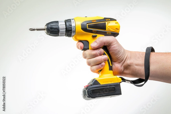 Obraz electric screwdriver in his hand