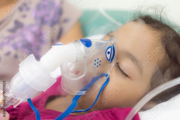 Fototapeta Appling aerosols inhalation