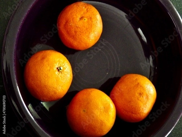 Obraz Four Oranges in a Purple Platter