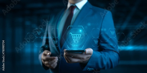 Fototapeta E-commerce and digital shop: businessman holds smartphone with add to cart icons. Business, retail, online store concept