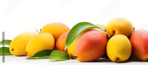 Obraz Multiple ripe mango fruits displayed together on a flat surface