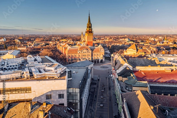 Fototapeta Aerial view of a famous Subotica town hall as a symbol of the city history and architectural heritage, with its red facade and elegant clock tower drawing visitors and tourists to Serbia