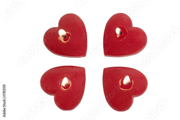Fototapeta Four red heart-shaped candles (isolated on white)