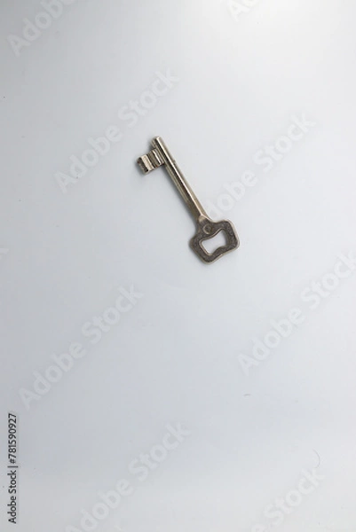 Fototapeta Close up of a key, white background.