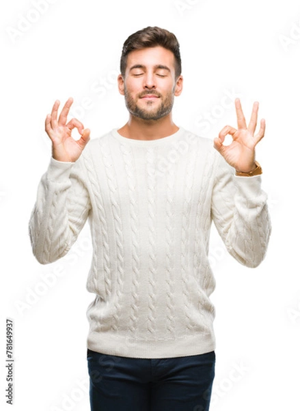 Obraz Young handsome man wearing winter sweater over isolated background relax and smiling with eyes closed doing meditation gesture with fingers. Yoga concept.
