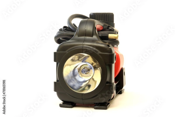 Fototapeta The automobile compressor isolated on white