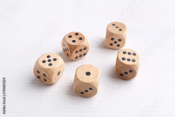 Fototapeta Many game dices on white wooden table