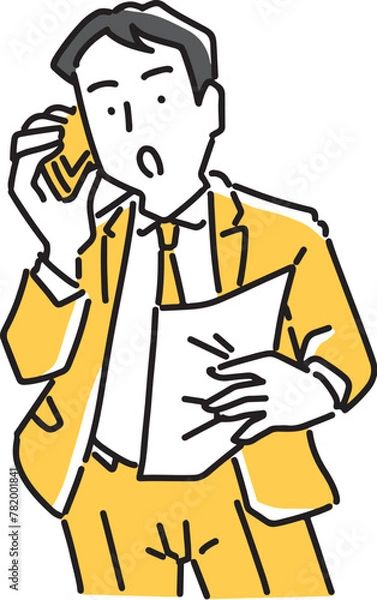 Fototapeta 書類を見ながらスマホで話すビジネスマン