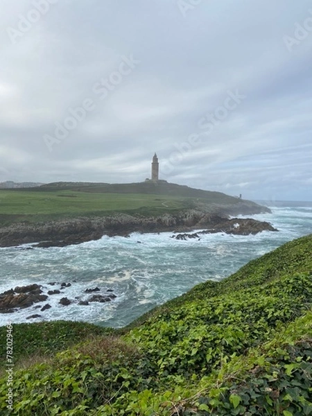 Fototapeta lighthouse on the rocks