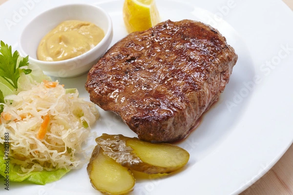 Fototapeta steak with cabbage salad