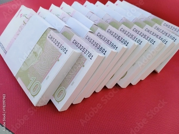 Fototapeta Bundle of Pakistani Currency. 10 Rupees note Pakistani, Pakistani currency note PKR 10 rupees. Heap of Pakistani currency bundle