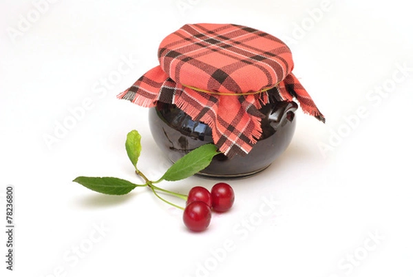Fototapeta jar of jam tied with a checkered headscarf