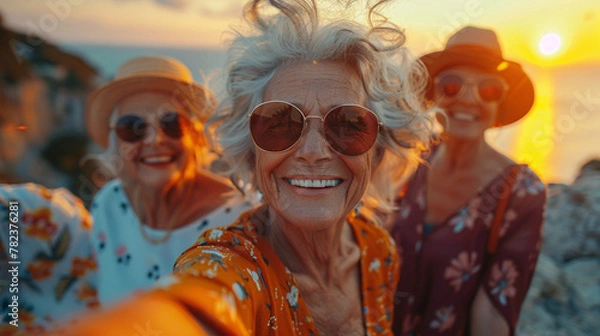 Obraz set of older women taking a selfie enjoying nature