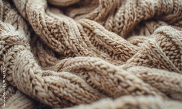 Fototapeta A cozy flat background with intricately knitted wool fabric