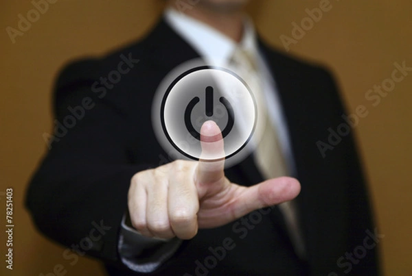 Fototapeta 電源スイッチを押すビジネスマン