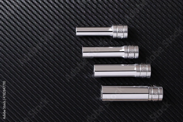 Obraz カーボン台に置かれたソケットレンチ