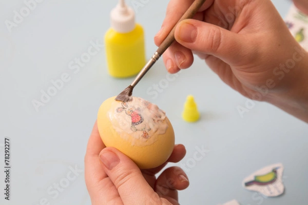 Fototapeta paste  image on  egg with  brush