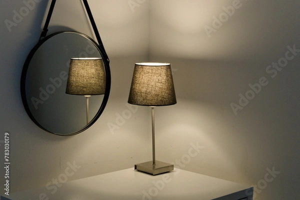 Fototapeta table lamp reflected in the mirror
