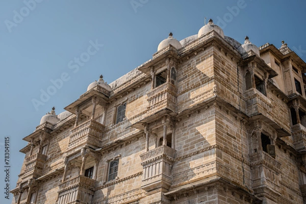 Fototapeta Udaipur, Rajasthan, India 07 April 2024: Shot of the historical exterior of City Palace. The palace was built nearly 400 years ago, with contributions from several rulers of the Mewar dynasty.