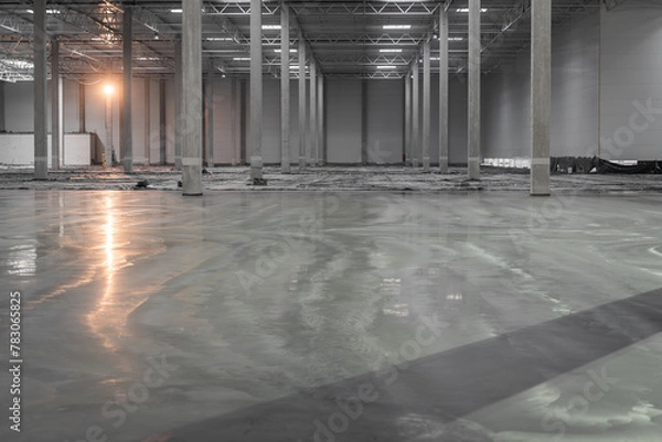 Fototapeta Industrial floor - construction process - screeding and grinding of the concrete floor