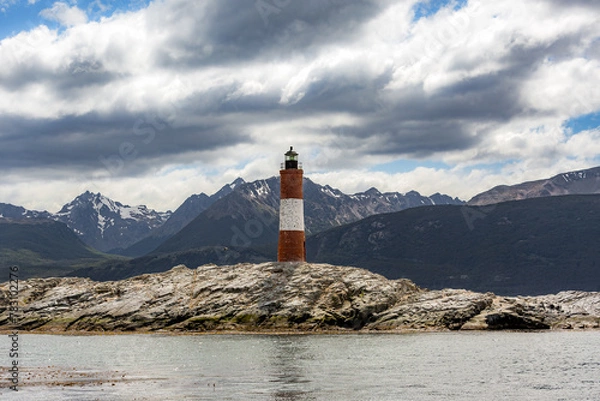 Obraz Lighthouse under a cloudy sky