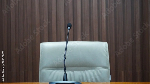 Fototapeta selective focus table microphone with white chair in the meeting room for teleconference                                                                                                