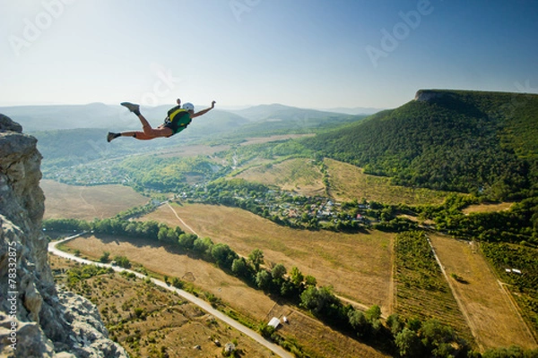 Obraz base-jumper jumps from the cliff