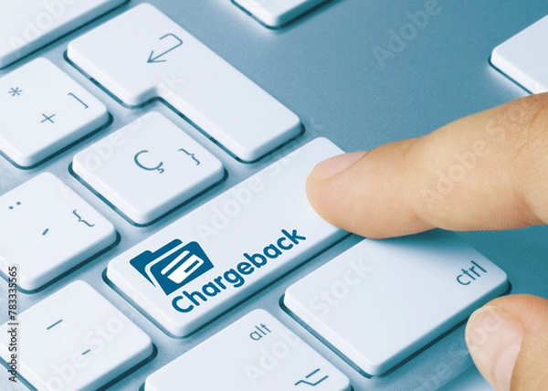 Fototapeta Chargeback - Inscription on Blue Keyboard Key.