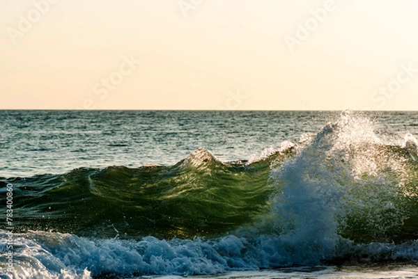 Obraz Backwashing wave at the shore