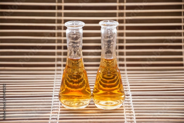 Obraz Glasses with rakija on a bamboo background
