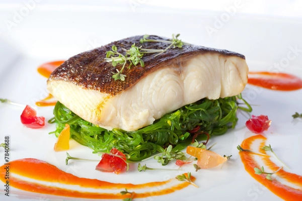 Obraz a piece of fried fish on white plate