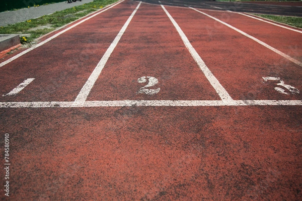 Fototapeta Running track numbers in stadium . Front view