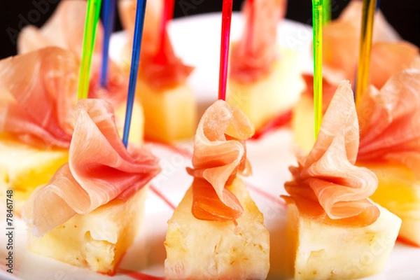 Obraz Canape with meat and pineapple.