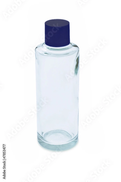 Fototapeta Empty glass bottle with blue cap