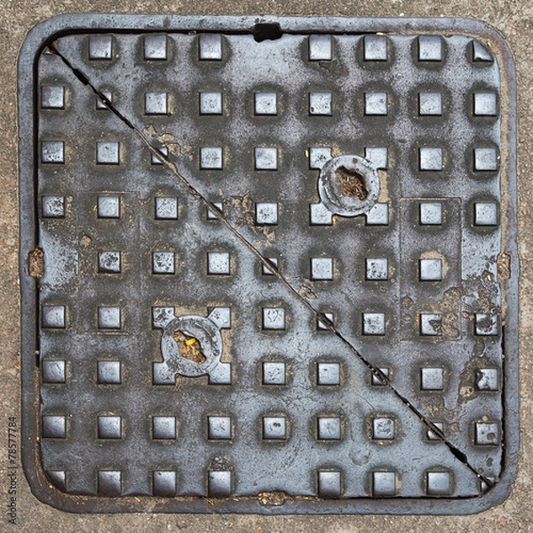 Obraz square metal manhole cover
