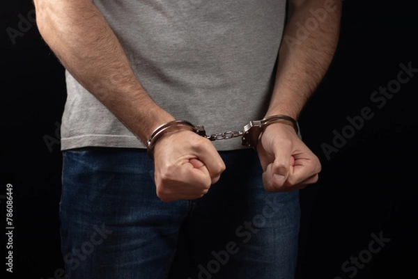Obraz Prisoner male hands criminal with handcuffs