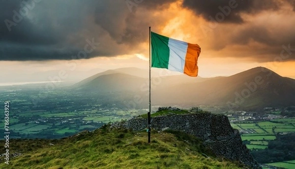 Fototapeta The Flag of Ireland On The Mountain.