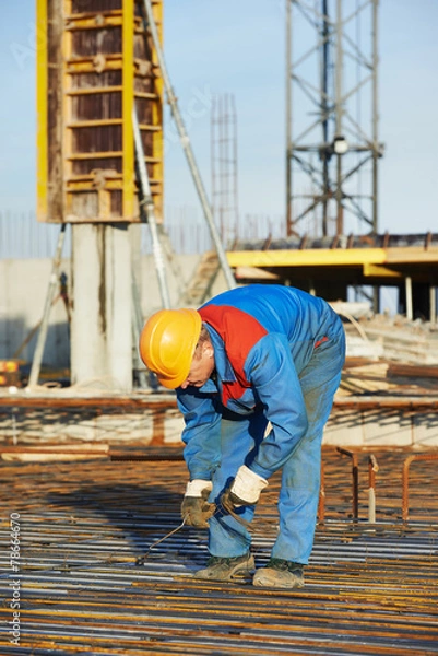 Obraz Builder making reinforcement for concrete